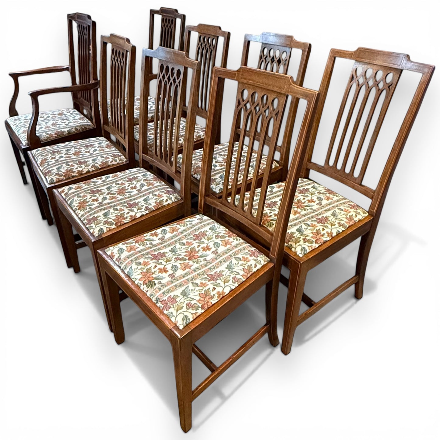Set of eight Edwardian inlaid mahogany dining chairs with carvers angled view