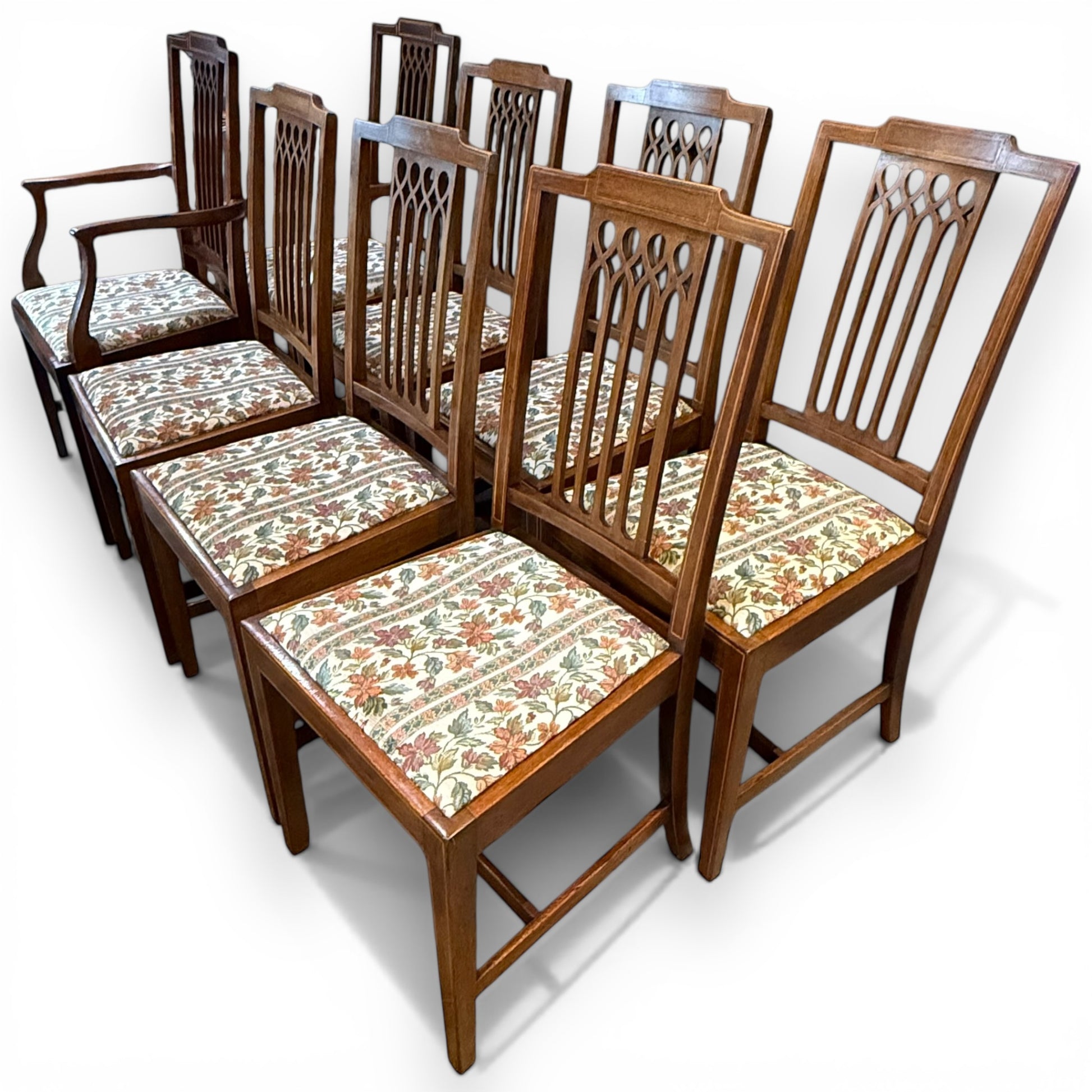 Set of eight Edwardian inlaid mahogany dining chairs with carvers angled view