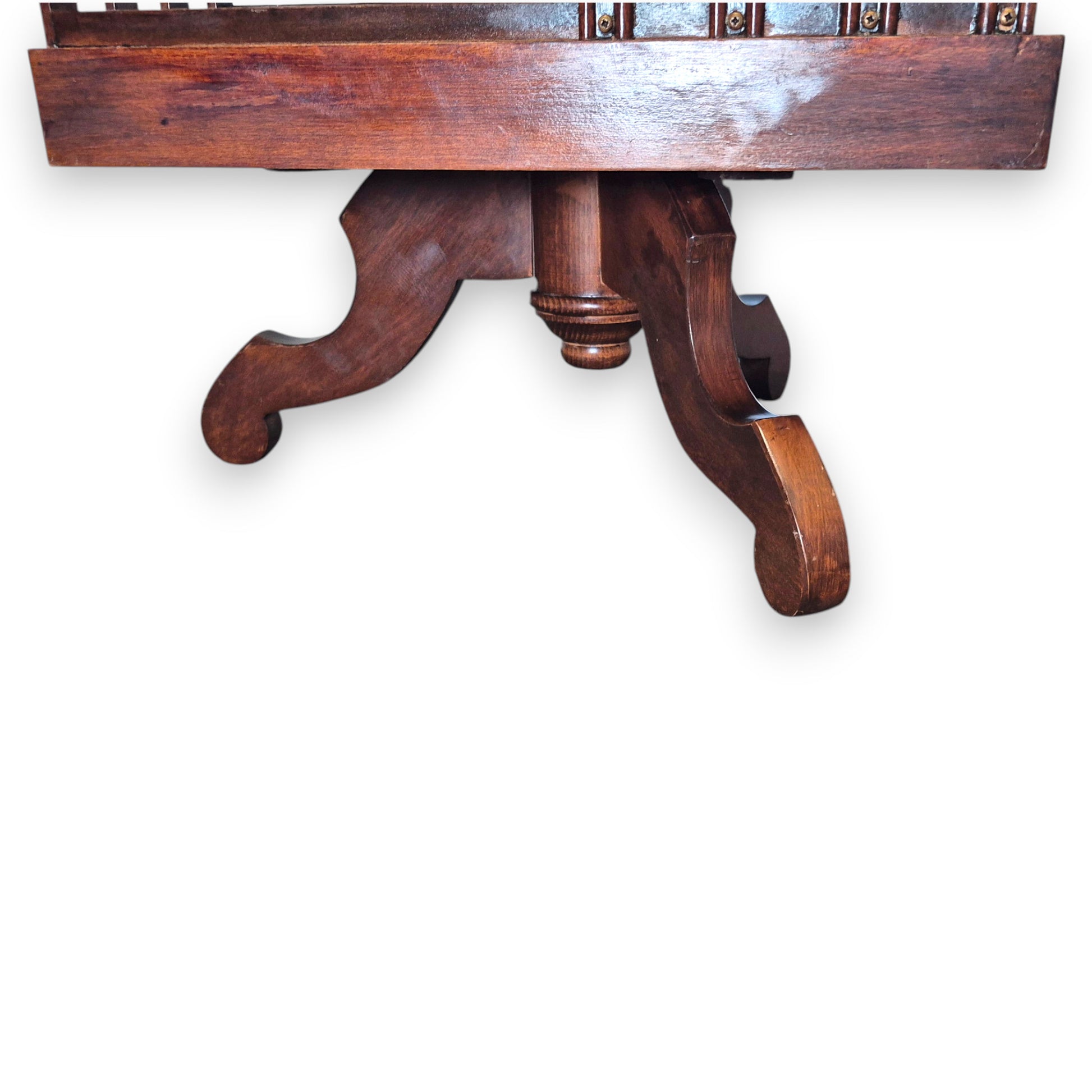 Antique revolving library bookcase showing revolving base