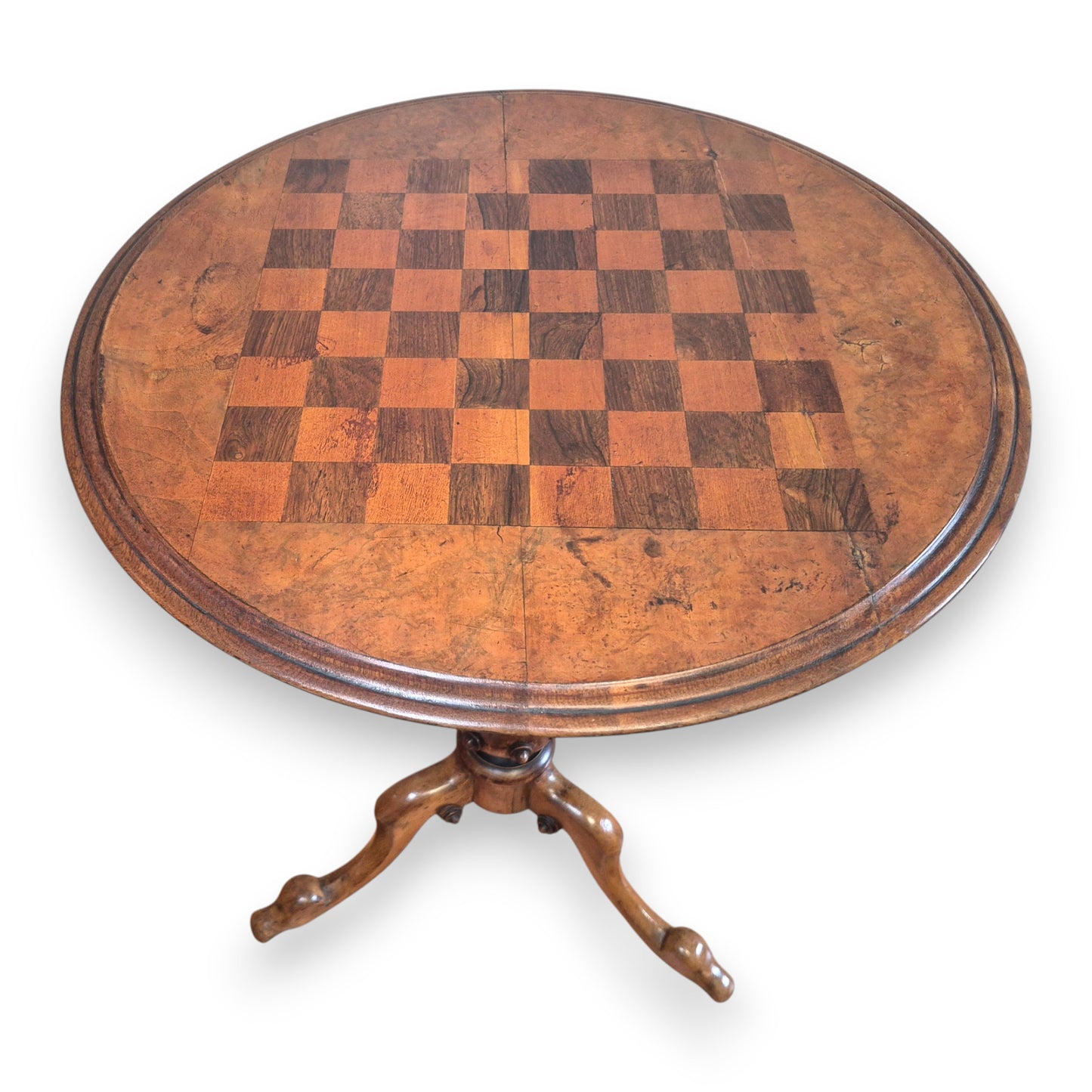 Antique games table with checkerboard inlay and elegant tripod base