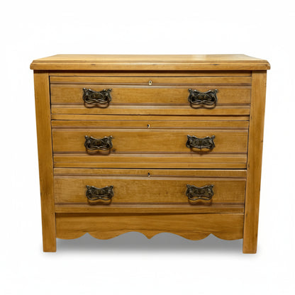 Front view of Edwardian pine chest of drawers 