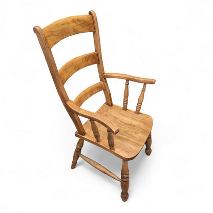 19th-century elm ladder-back armchair with shaped arms and solid seat