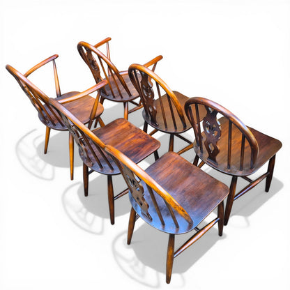 vintage ercol chairs with carvers hoop back dining set rear view