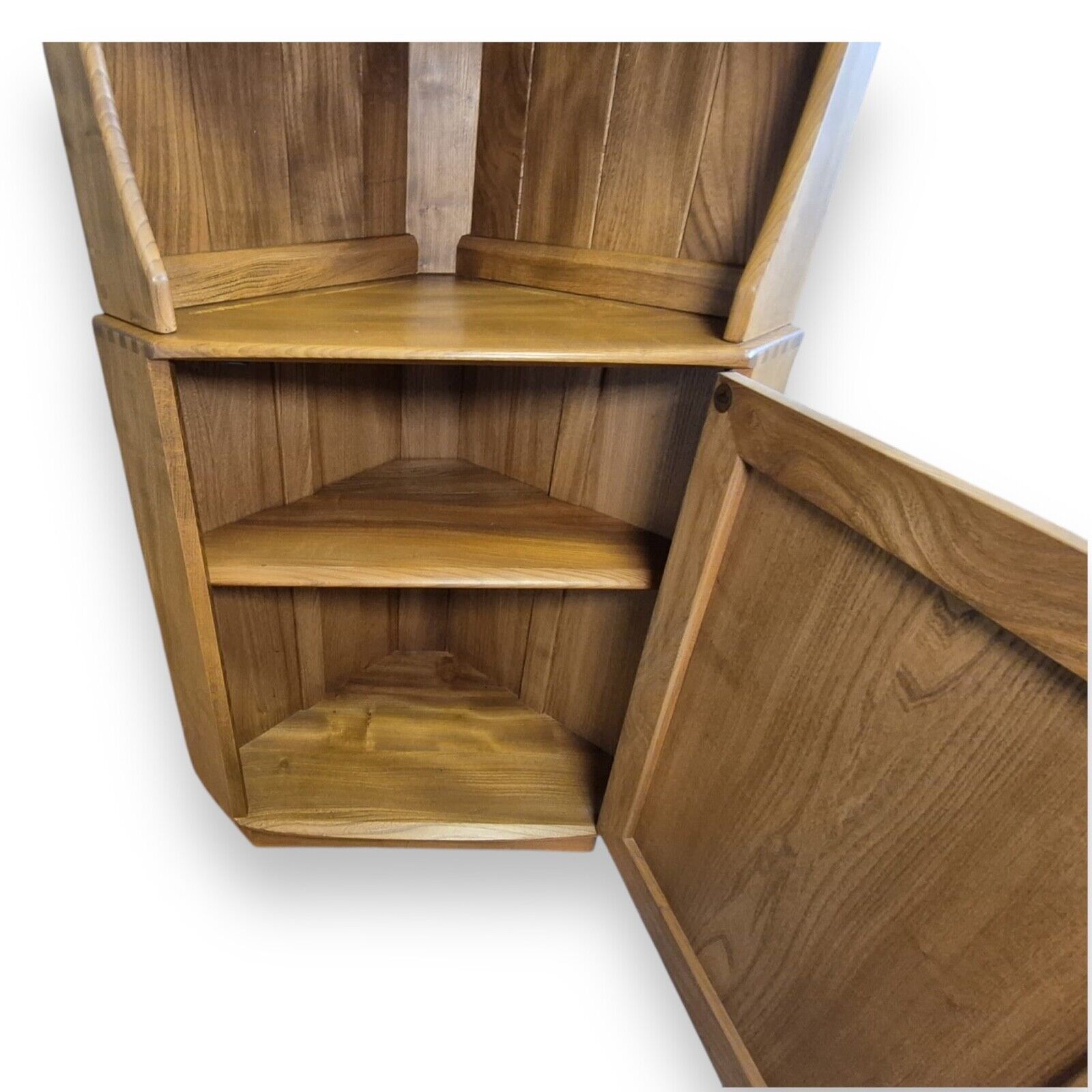 Ercol elm cabinet – lower door open showing internal shelved storage