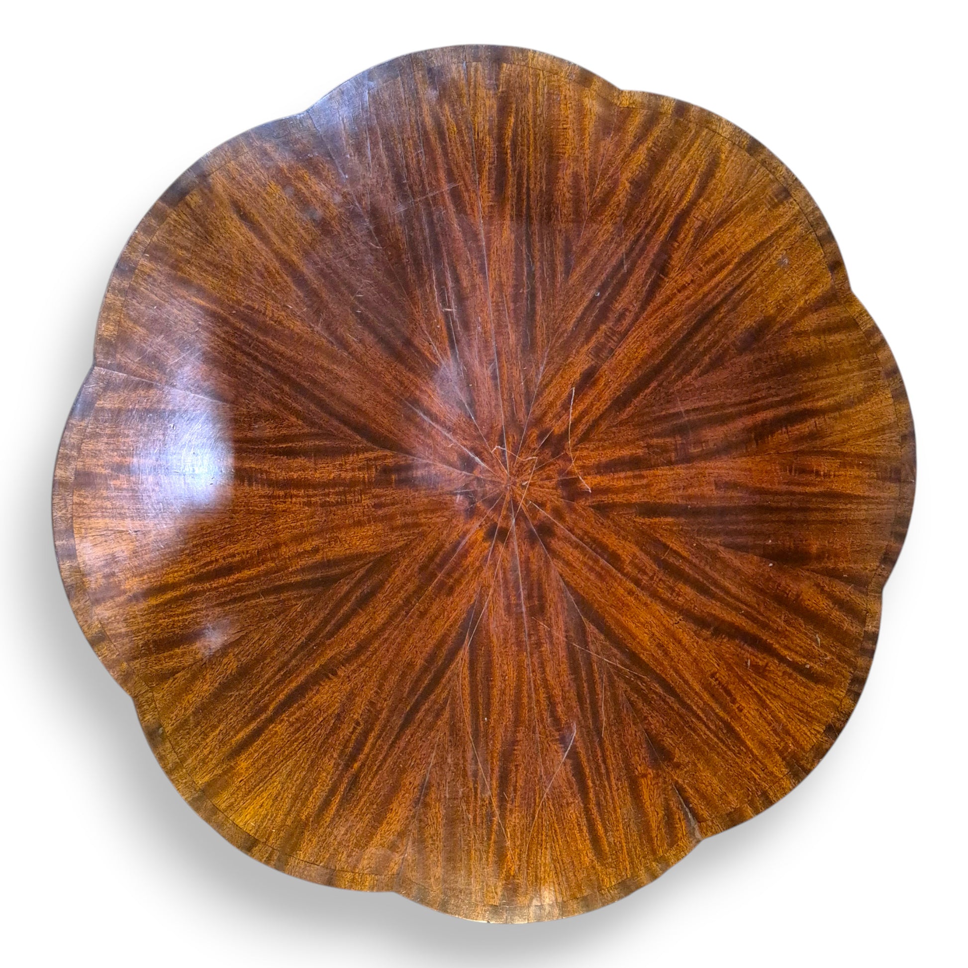 Flame mahogany sunburst veneer top on an Art Deco library coffee table
