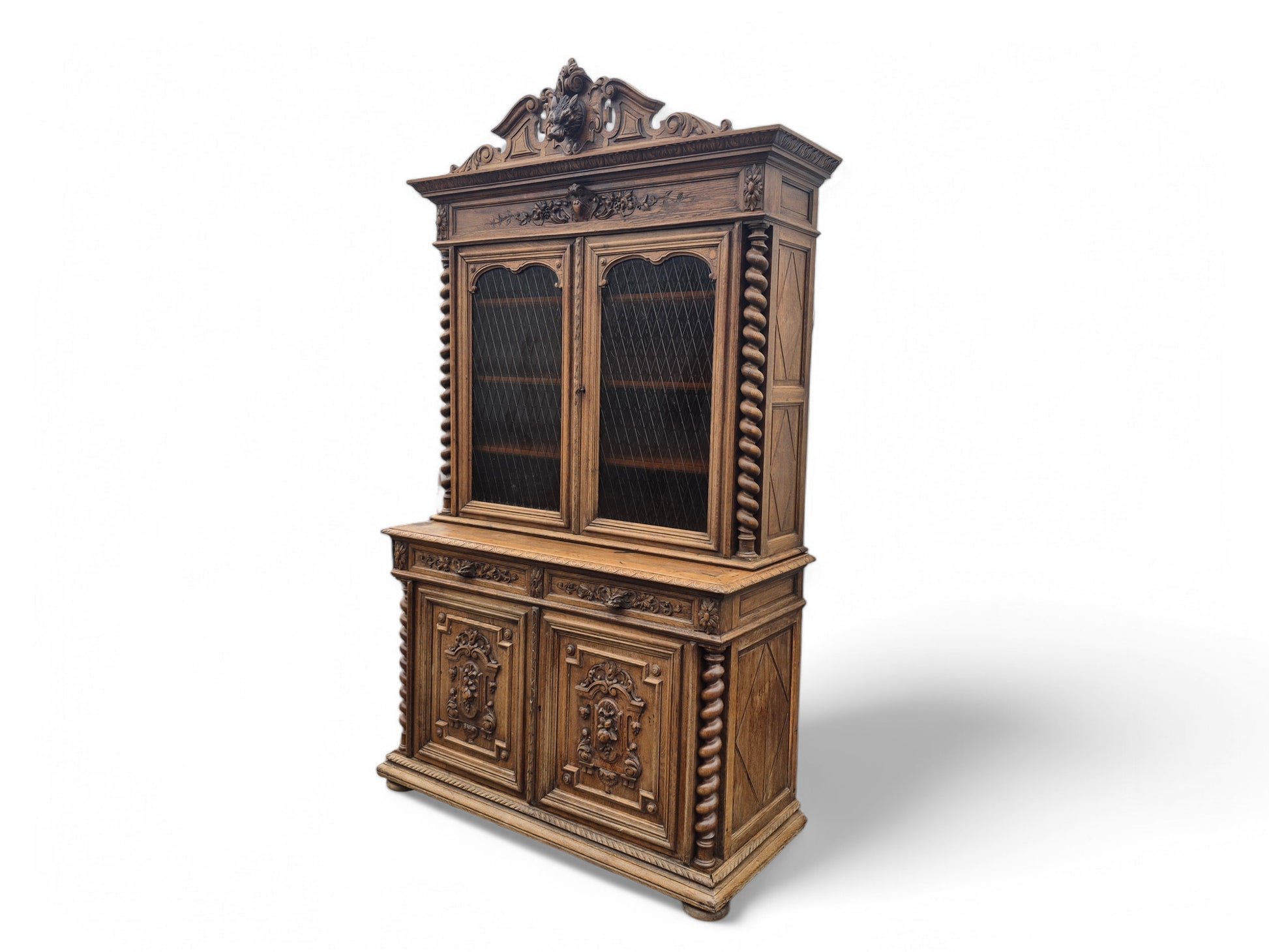 Angled view of Antique French solid oak bookcase dresser late 19th century
