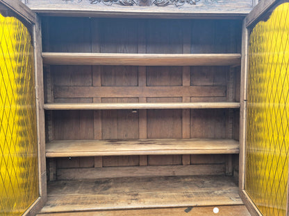 Interior shelves of antique French oak dresser – ample storage and display space