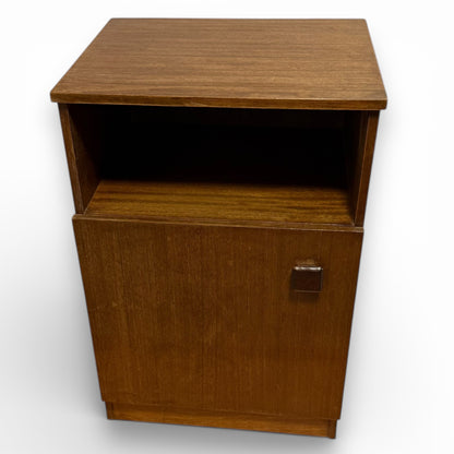 Front view of mid century Remploy teak bedside cabinet with open shelf and cupboard
