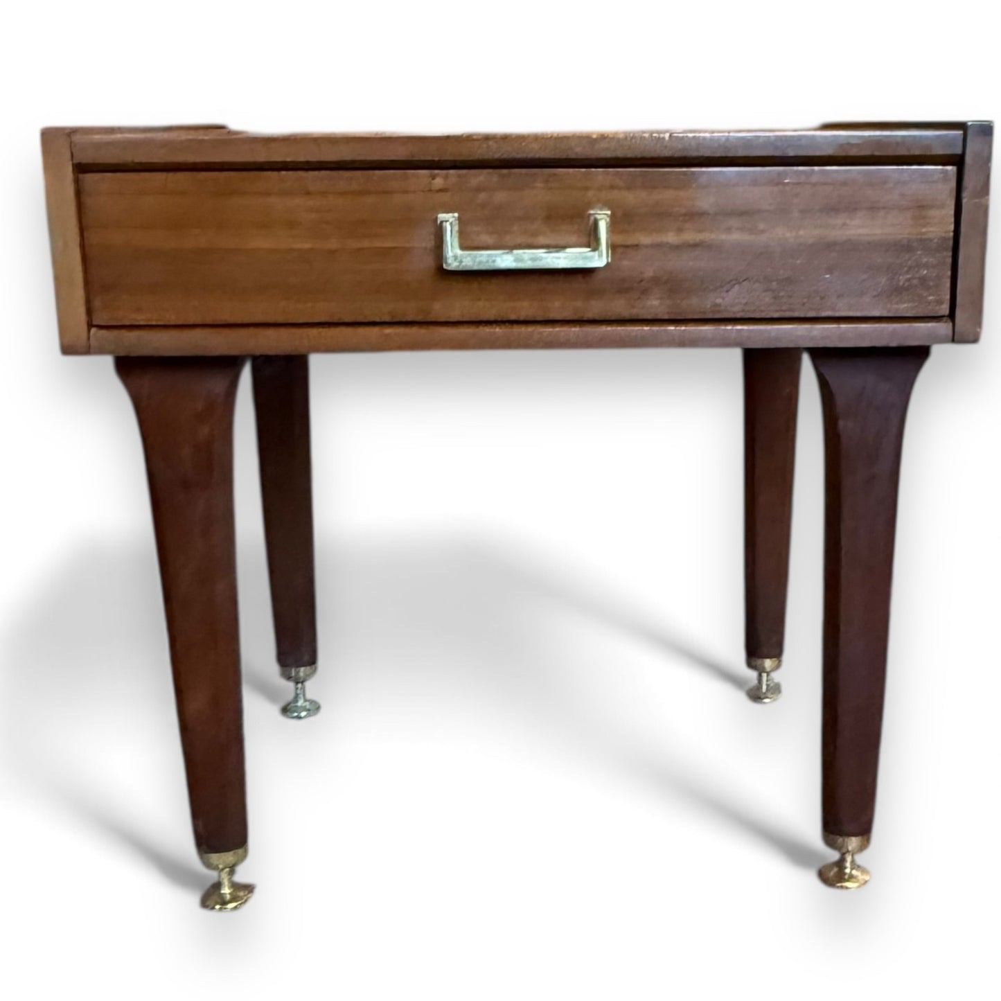 Close-up of brass handle and drawer front detailing