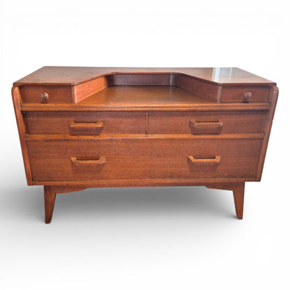 Close up of teak grain on G Plan Fresco dressing table top