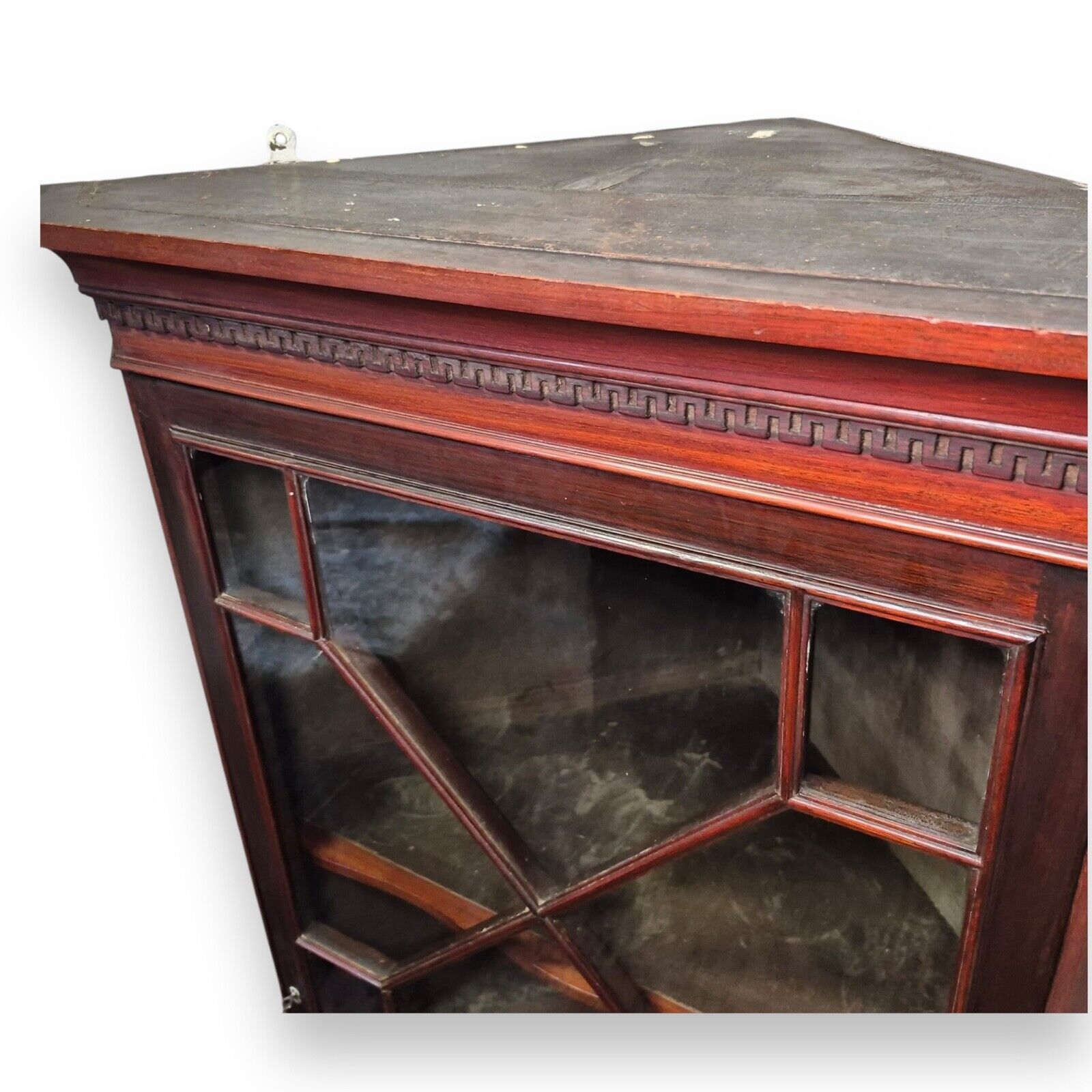 Antique Georgian cabinet – close-up of moulded and dentil frieze