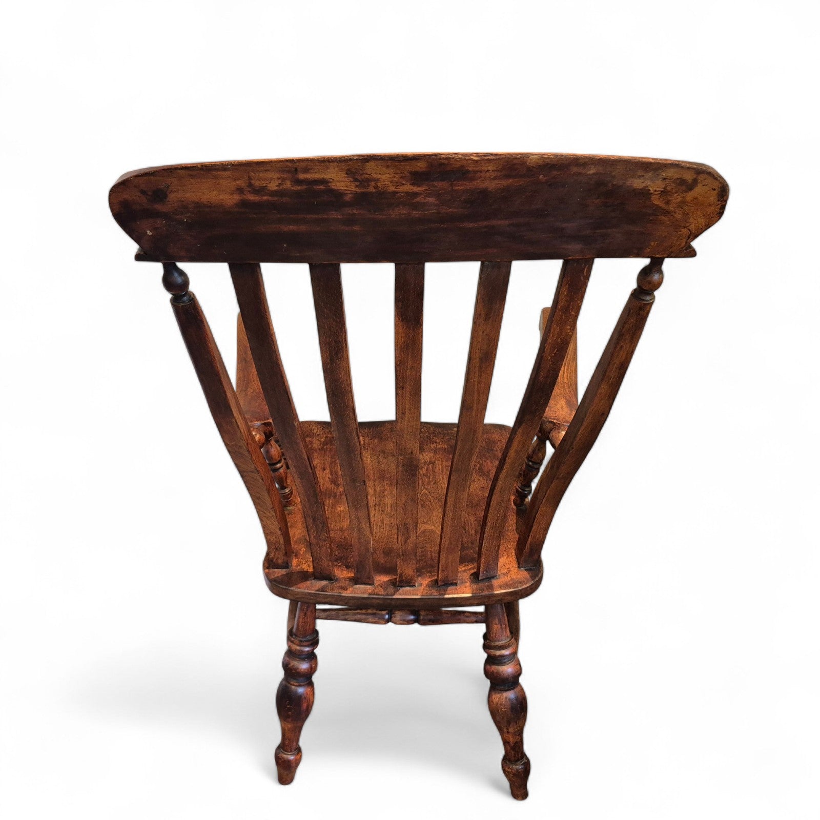 Rear view showing elegant high lath-back design on antique Windsor chair