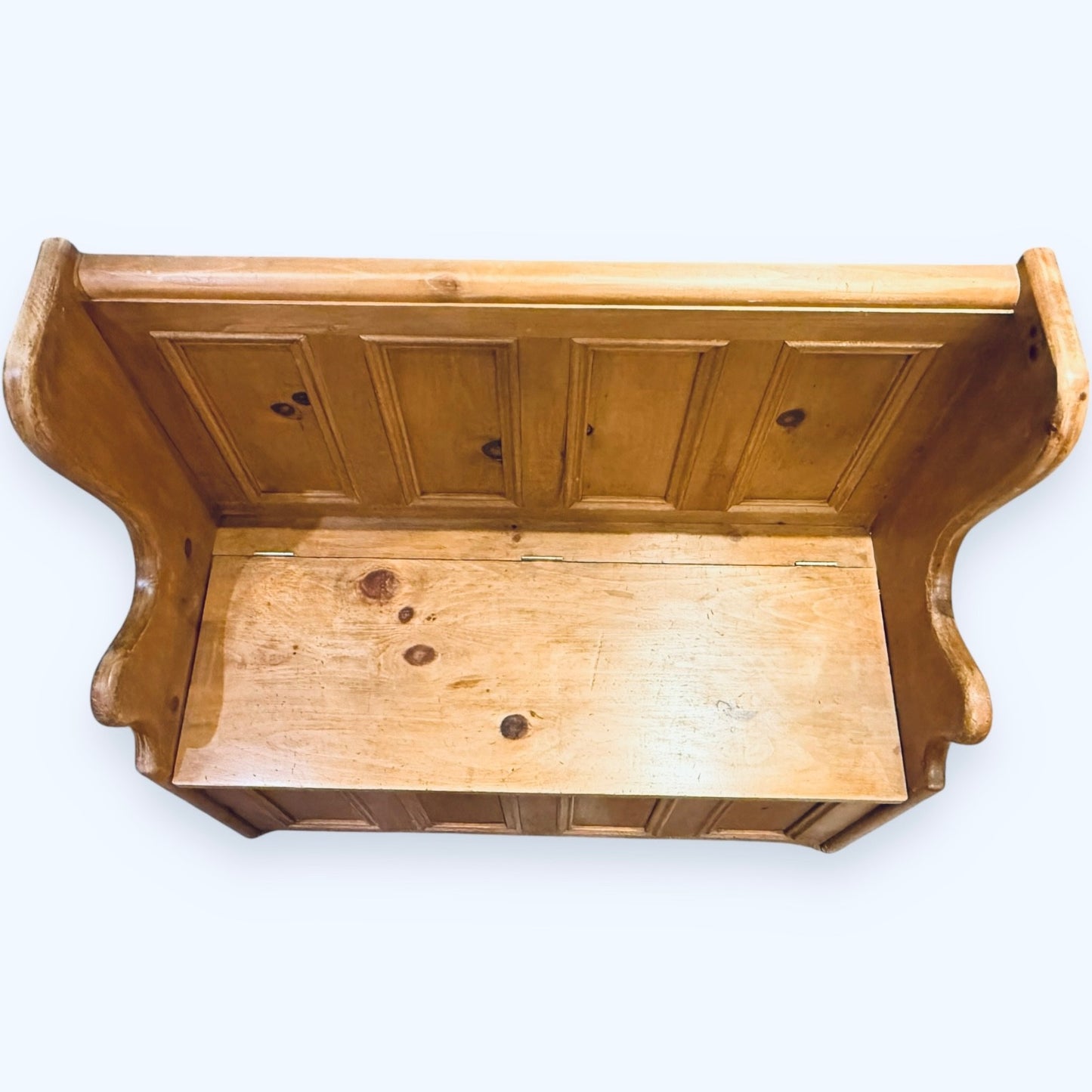 Lift-up seat storage compartment on rustic pine bench