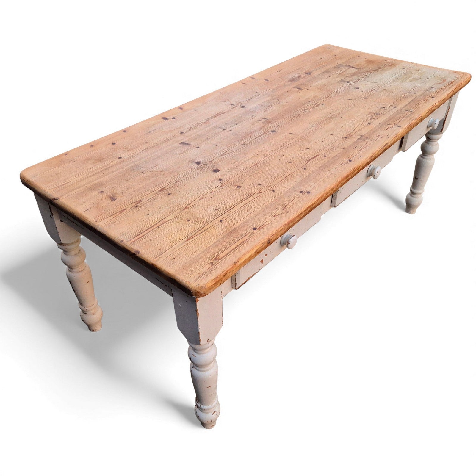 Solid pine country kitchen table with worn top and painted leg base