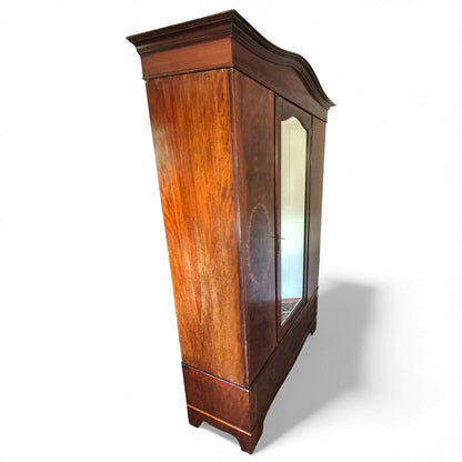 Side view of Mahogany wardrobe with floral inlay and bevel mirror