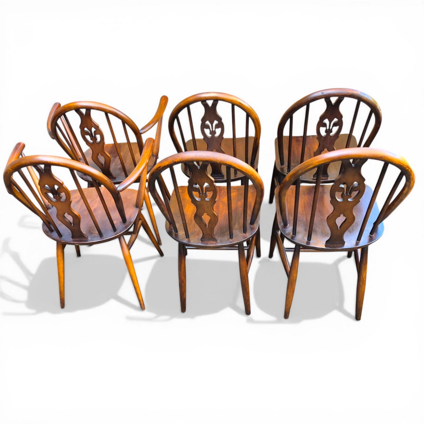 vintage ercol chairs with carvers hoop back dining set back view