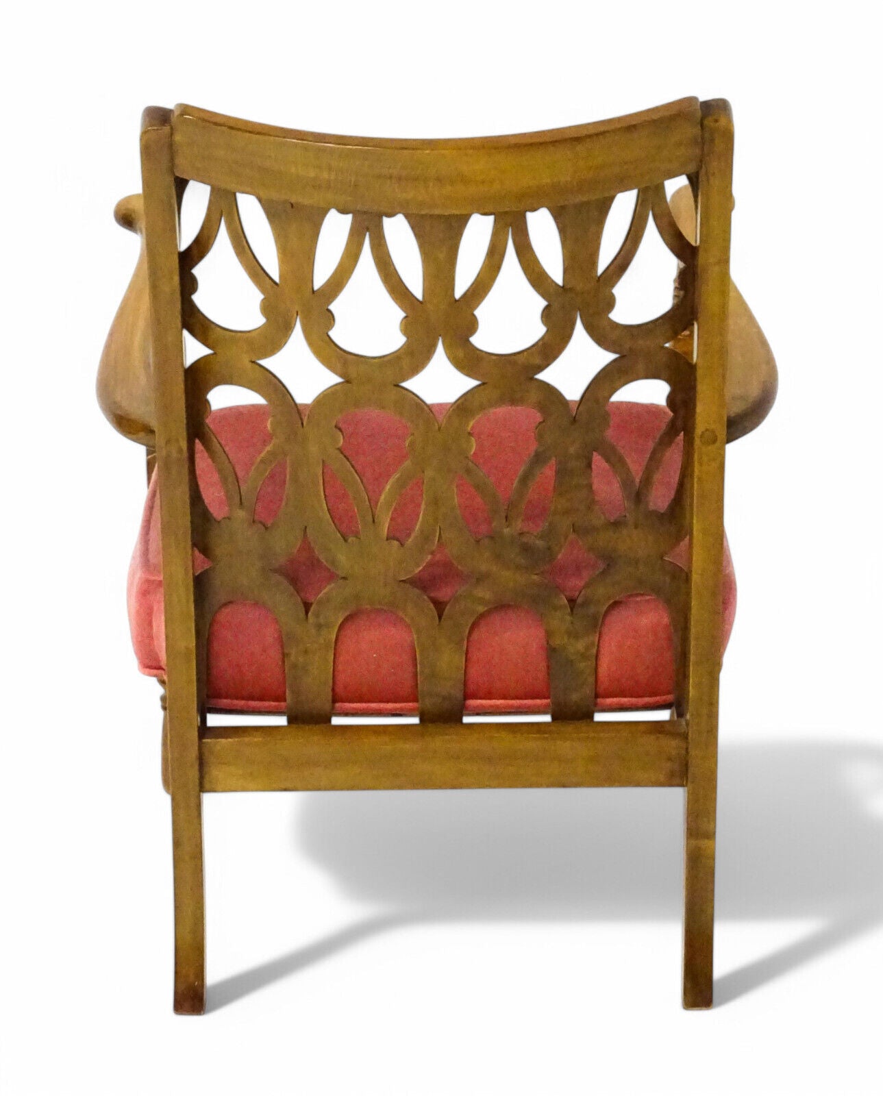 Rear view of 1940s fretwork utility chair with decorative carving
