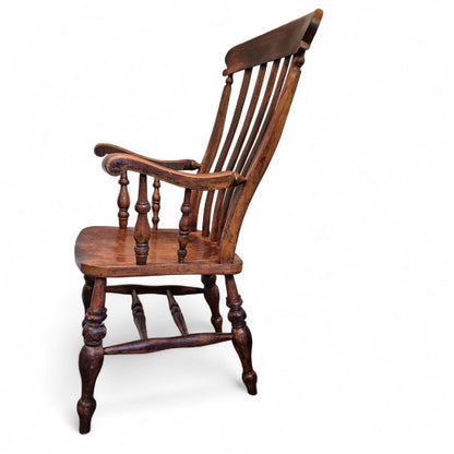 Side view of antique oak and elm Windsor chair c1900 – rustic English farmhouse style