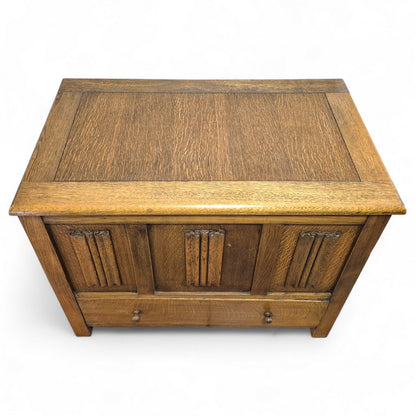1960s vintage oak blanket box with carved linenfold panel front