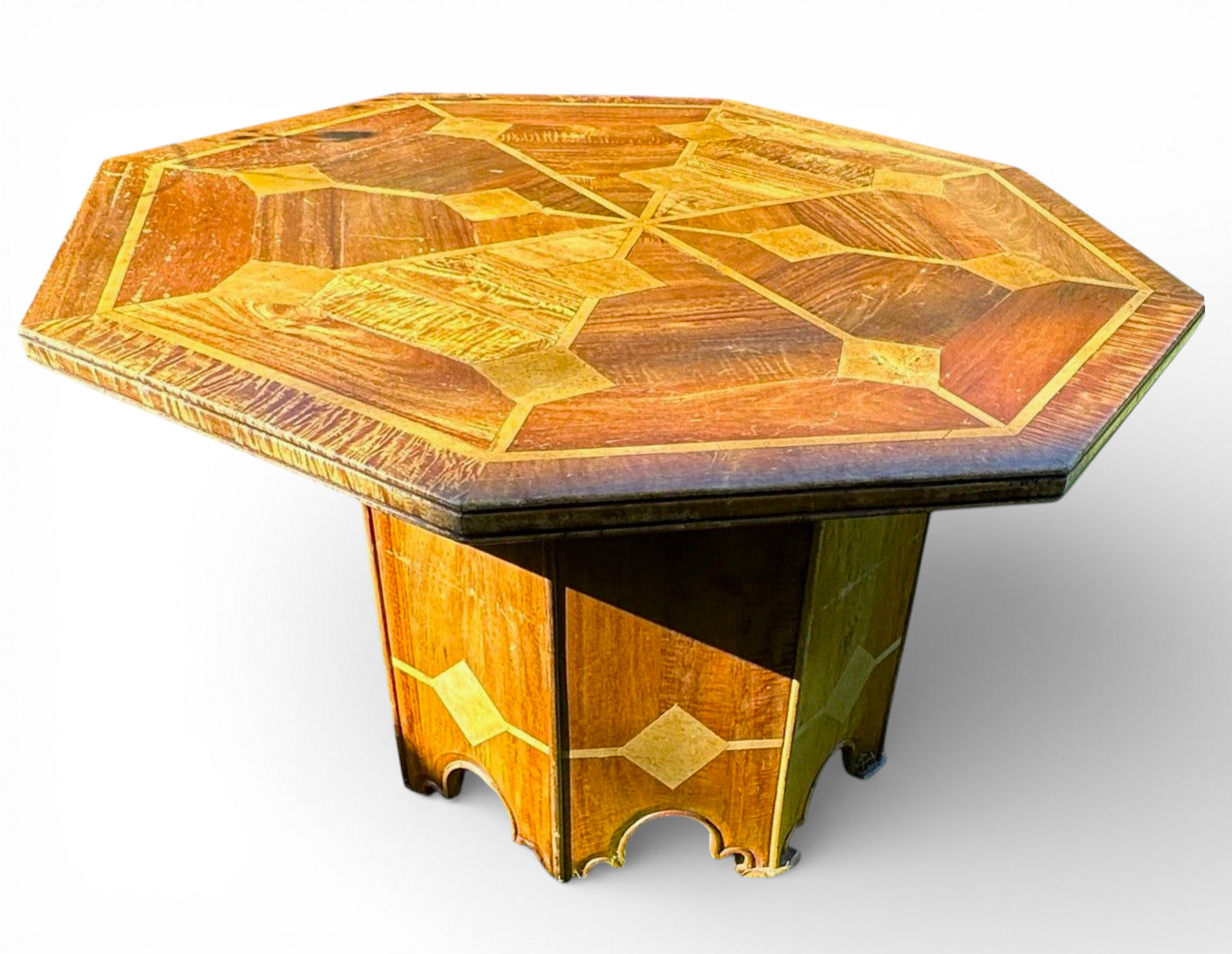 Octagonal top of mid-century Danish walnut dining table with marble inlay