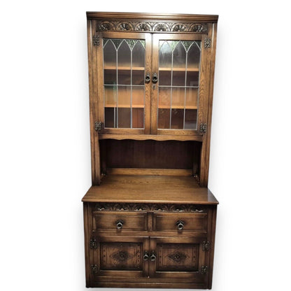 Old Charm oak Arts and Crafts bookcase and cupboard – front view showing shelves and base cabinet