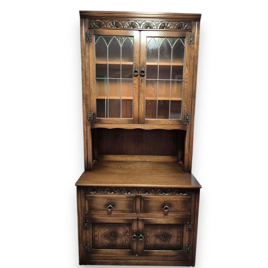 Old Charm oak Arts and Crafts bookcase and cupboard – front view showing shelves and base cabinet