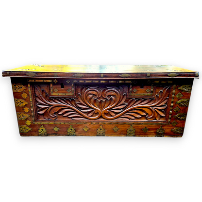 Antique padouk box with carved front and decorative brass mounts
