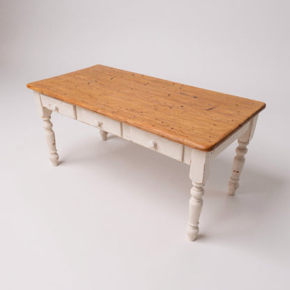 Pine farmhouse kitchen table with aged plank top and painted base
