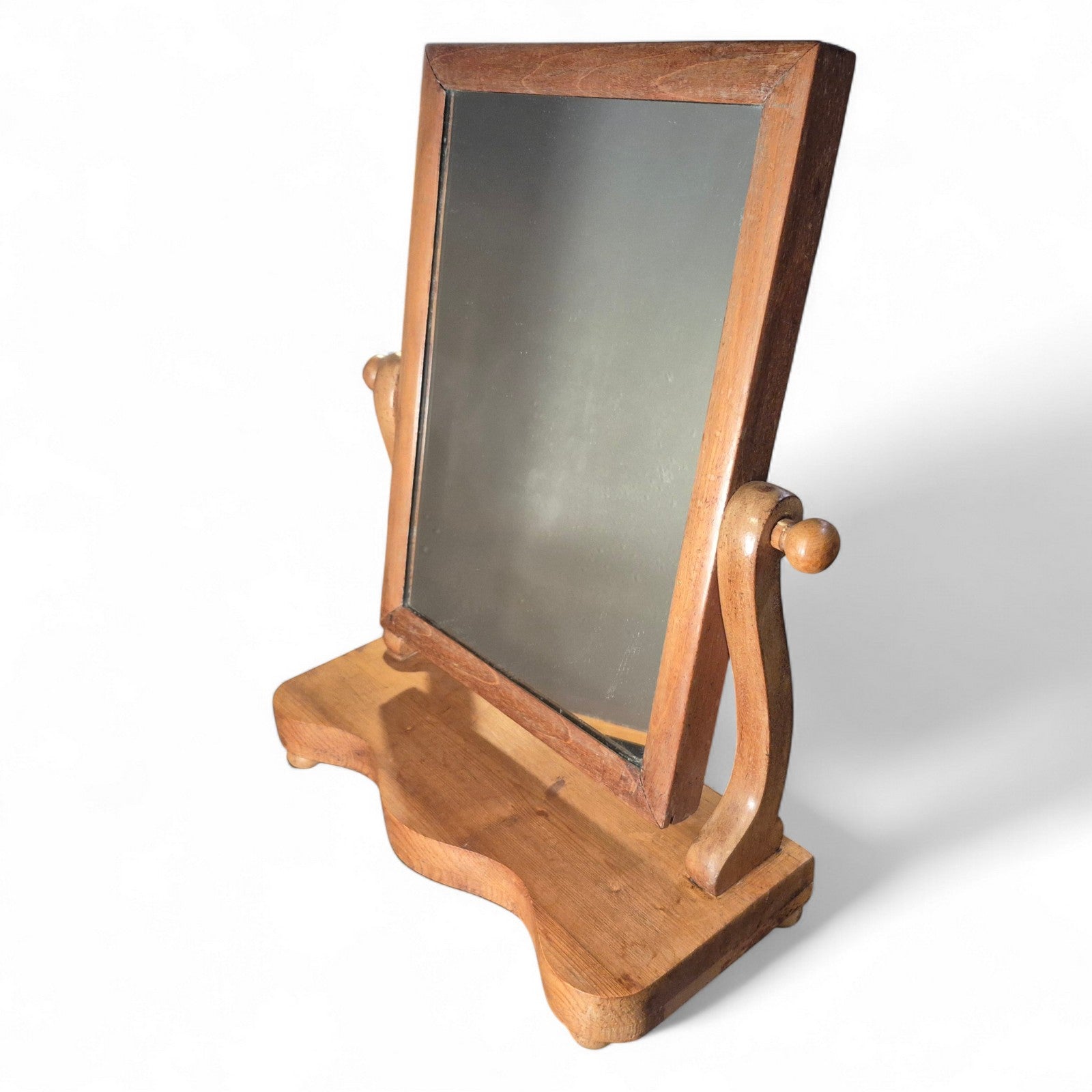 Side view of Victorian pine bathroom mirror with turned knobs