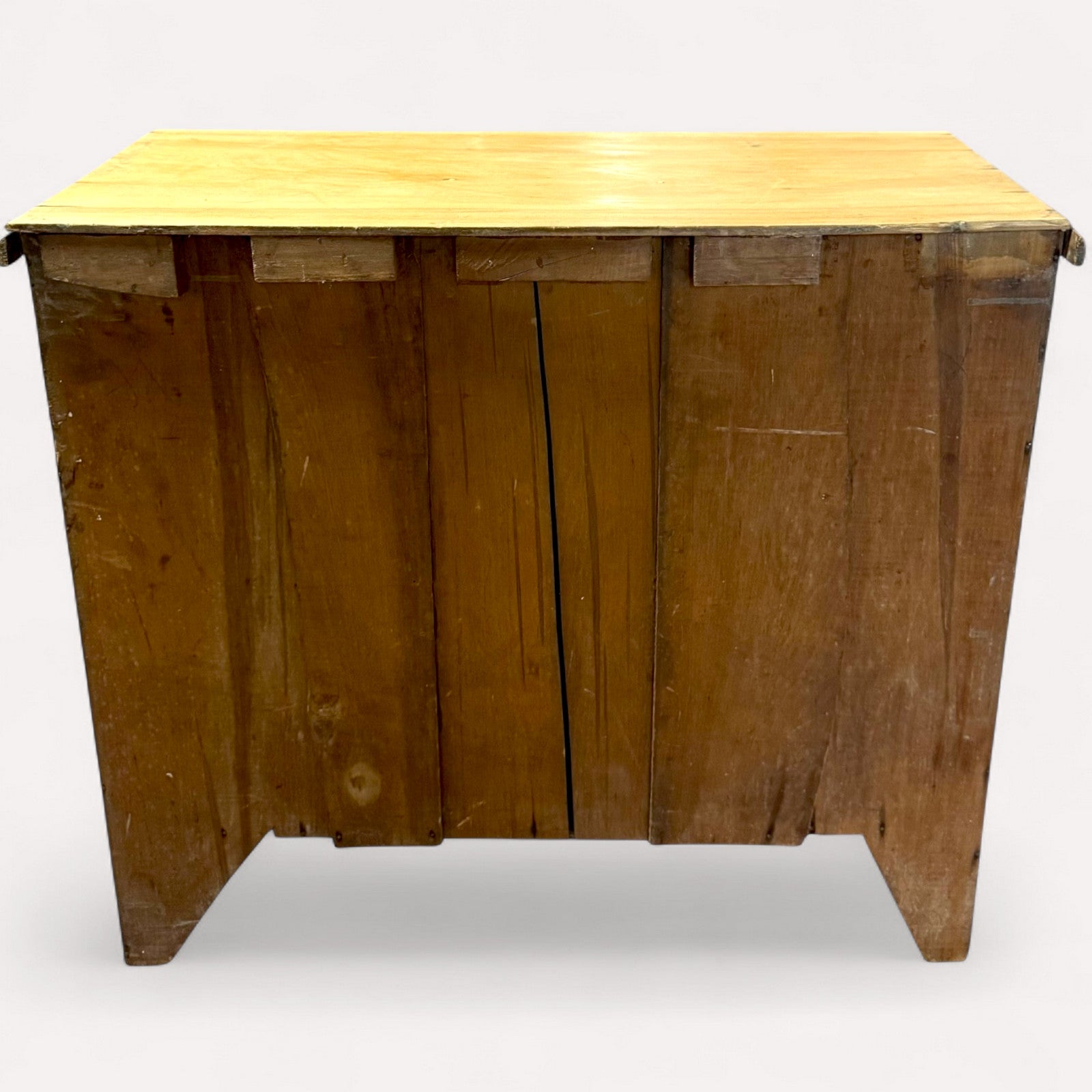 Rear view of antique pine chest showing age-related wear and marks