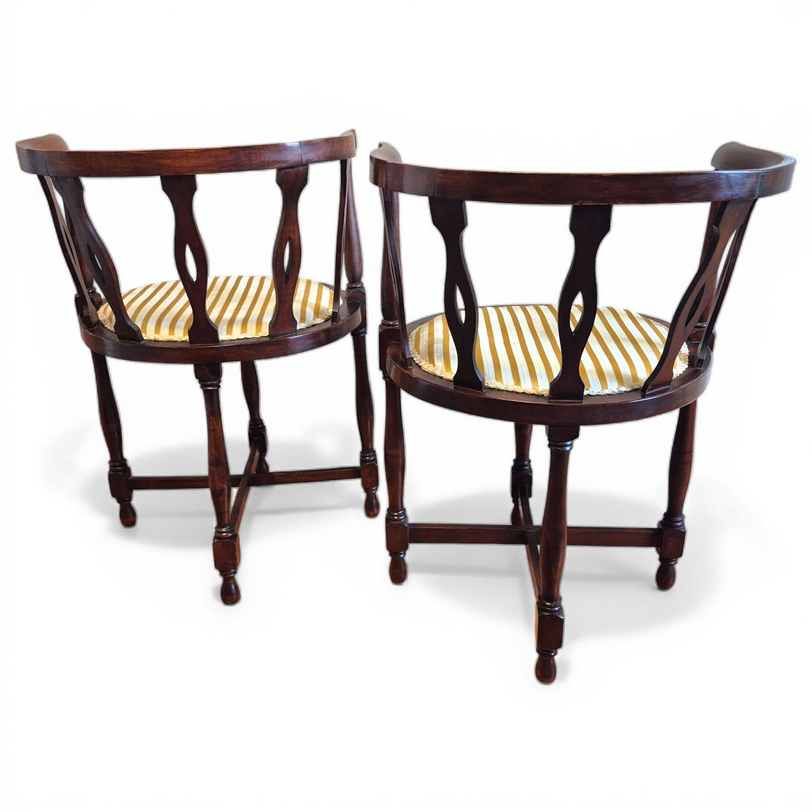 Rear view of Victorian mahogany tub chair showing curved horseshoe back