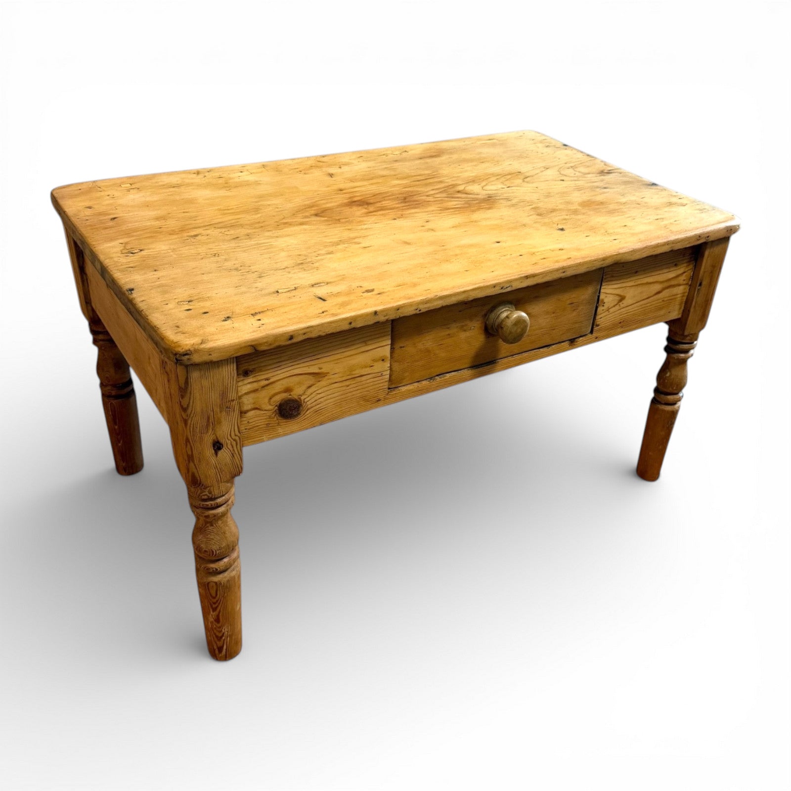 Vintage pine coffee table with natural wax finish and traditional farmhouse look
