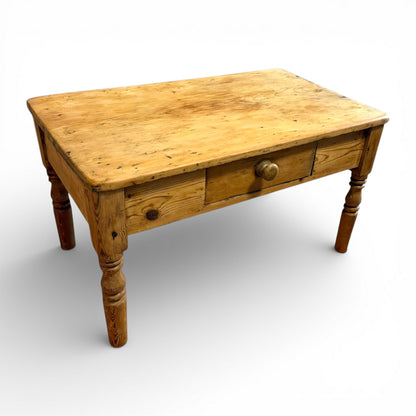 Vintage pine coffee table with natural wax finish and traditional farmhouse look