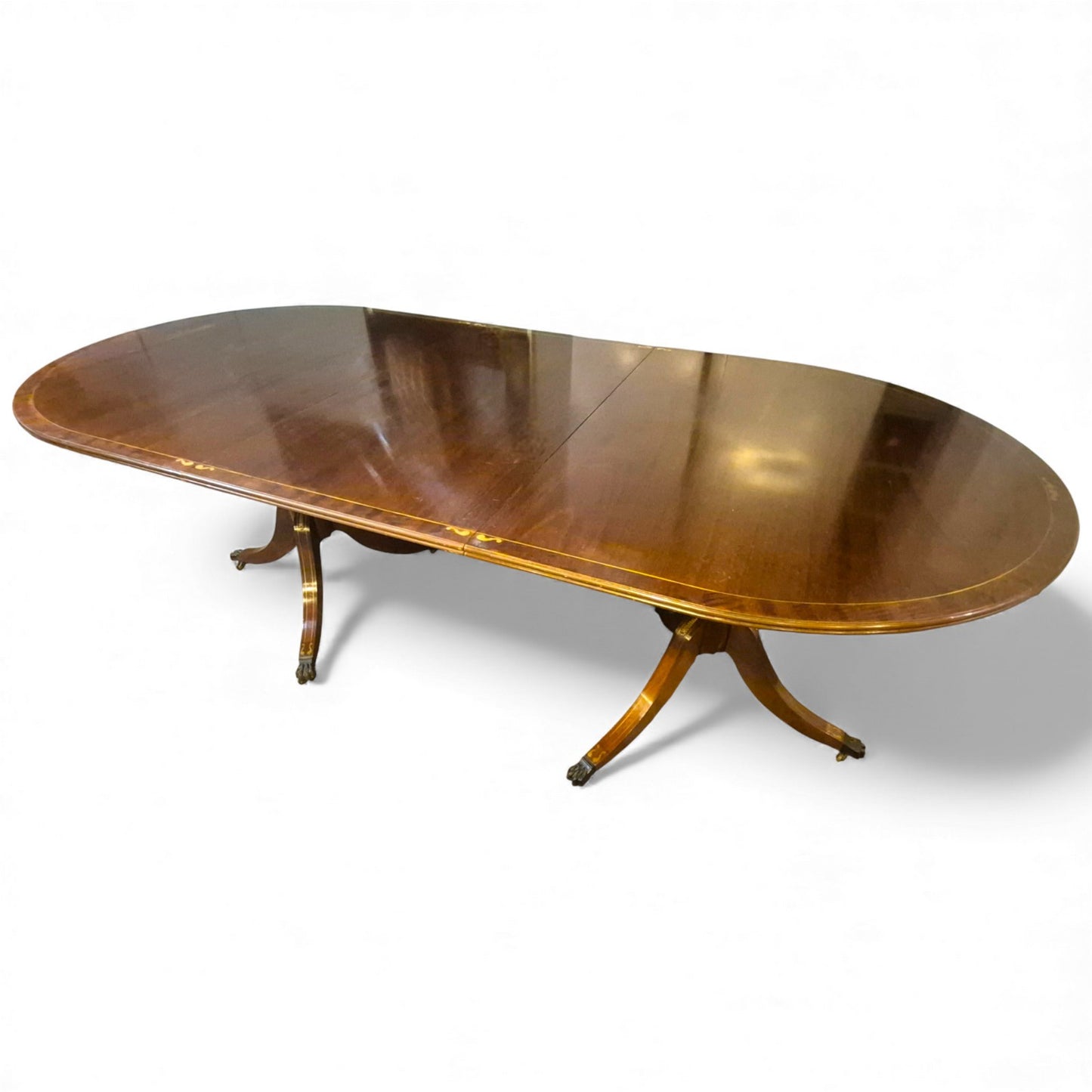 Antique mahogany extending dining table – full view of oval top and twin pedestal base”