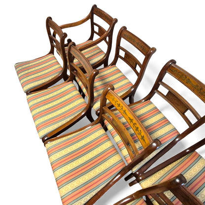 Regency style mahogany dining chairs with brass inlay