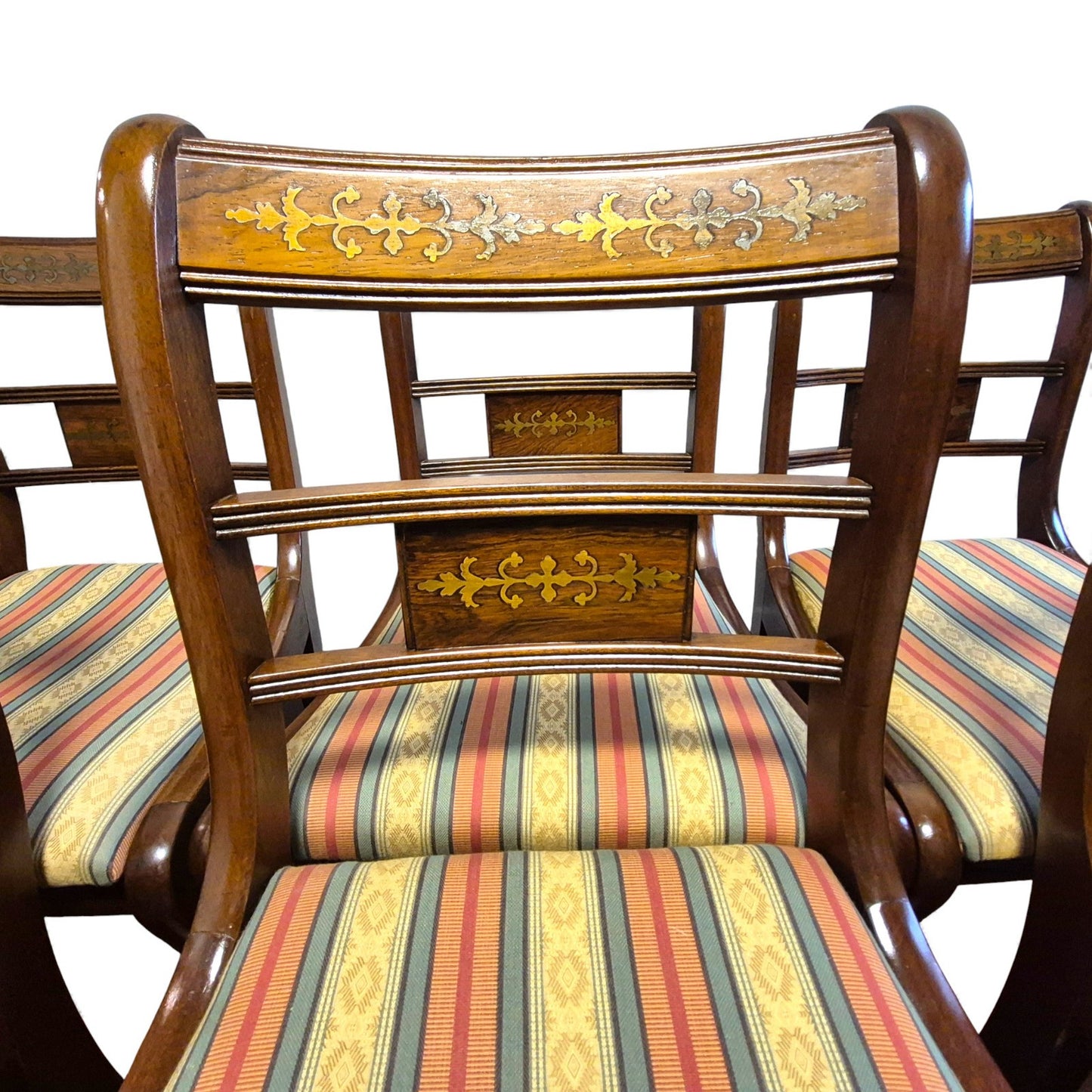 Brass inlaid crest rail detail on Regency dining chair