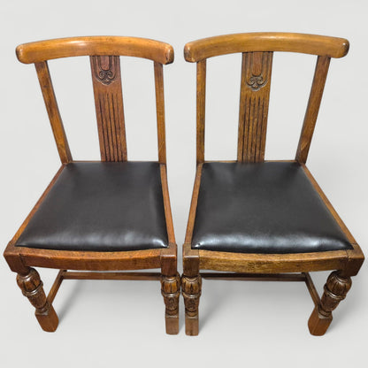 Carved back detail of 1920s honey oak dining chair showing fluted design