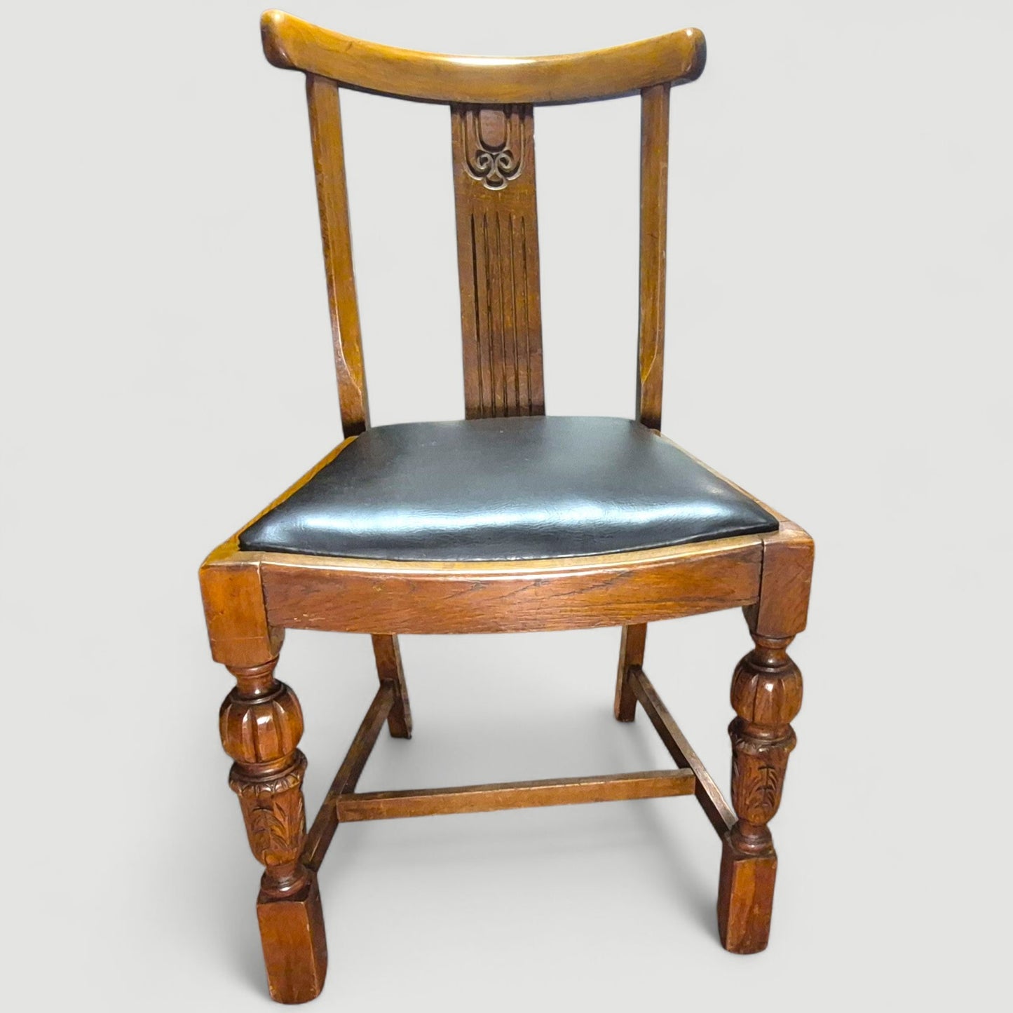 Set of 4 Vintage 1920s Honey Oak Dining Chairs – Carved Detail & Black Upholstered Seats