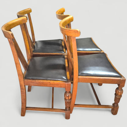 Set of 4 Vintage 1920s Honey Oak Dining Chairs – Carved Detail & Black Upholstered Seats