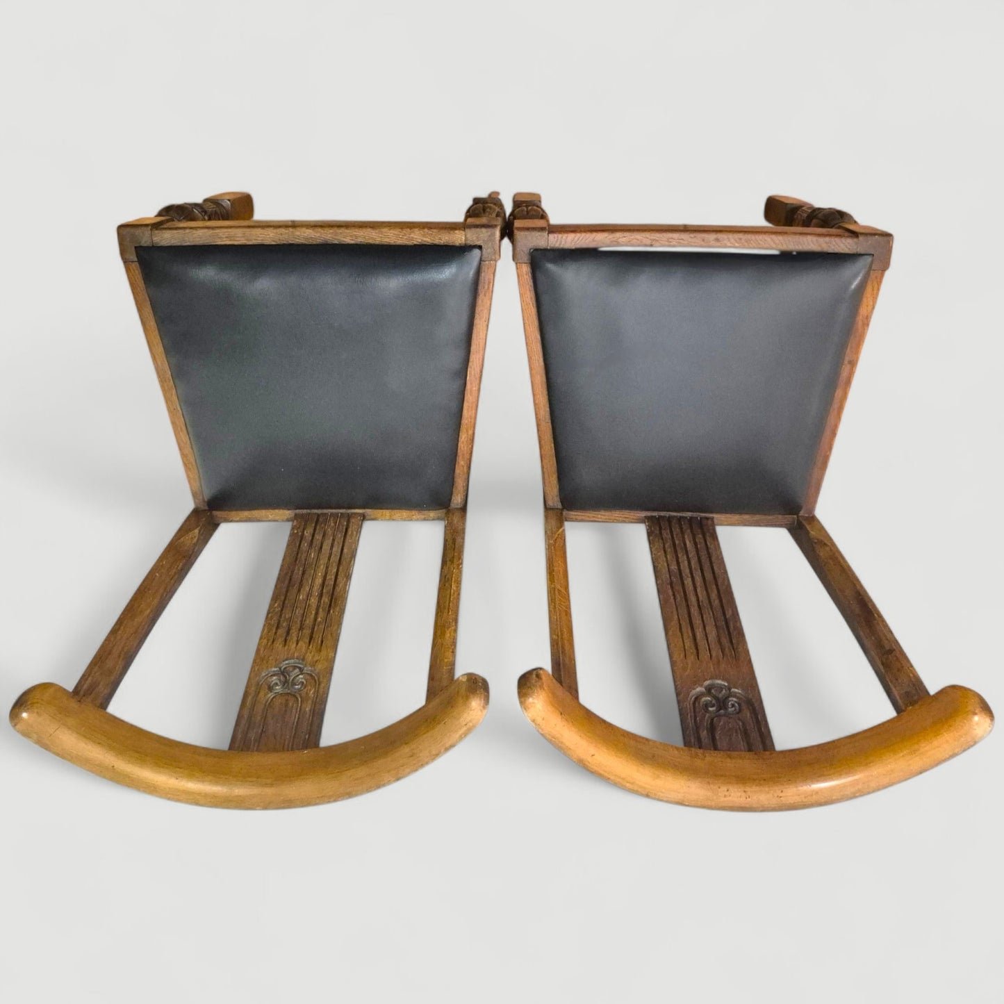 Set of 4 Vintage 1920s Honey Oak Dining Chairs – Carved Detail & Black Upholstered Seats