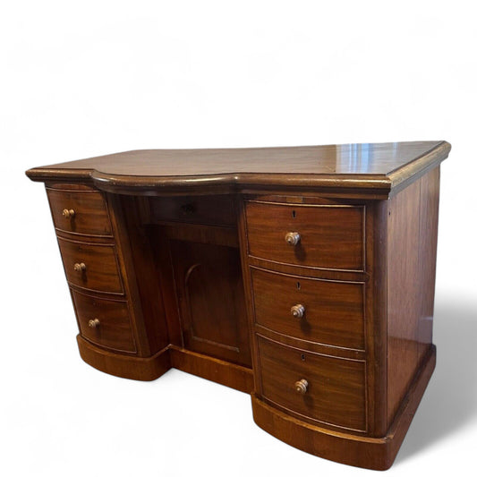 Victorian one-piece Mahogany Bow Front Six Drawer Kneehole Desk