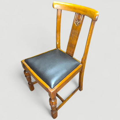 Set of 4 Vintage 1920s Honey Oak Dining Chairs – Carved Detail & Black Upholstered Seats