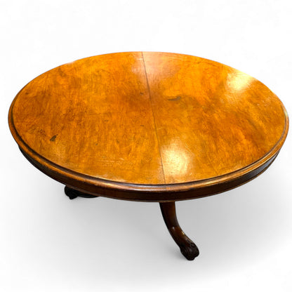Round wooden table with a white background