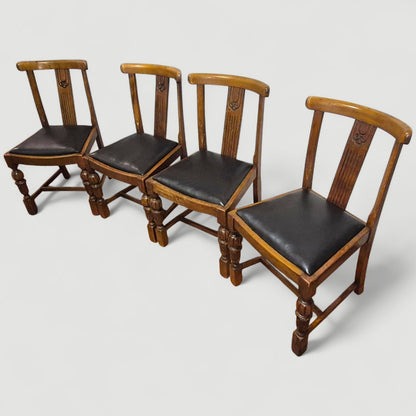 Set of 4 Vintage 1920s Honey Oak Dining Chairs – Carved Detail & Black Upholstered Seats