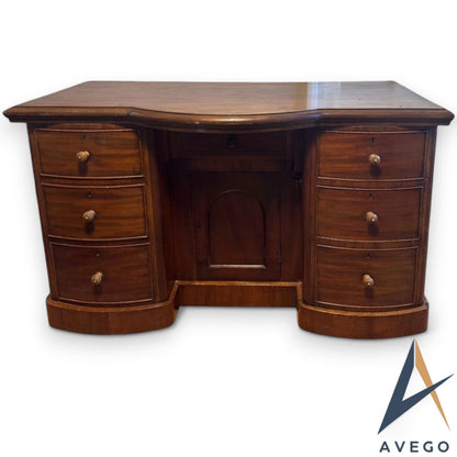 Victorian one-piece Mahogany Bow Breakfront Six Drawer Kneehole Desk
