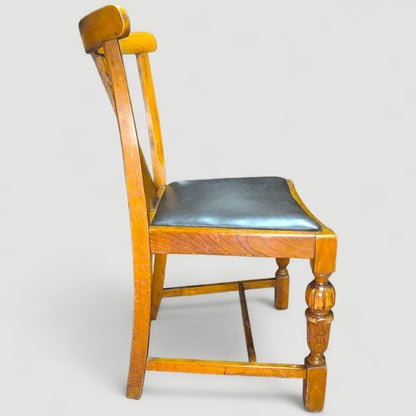 Set of 4 Vintage 1920s Honey Oak Dining Chairs – Carved Detail & Black Upholstered Seats