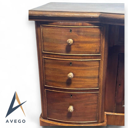 Victorian one-piece Mahogany Bow Breakfront Six Drawer Kneehole Desk