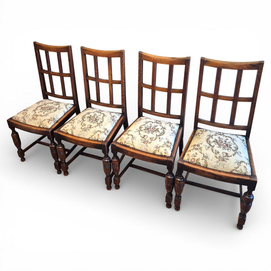 Set of four Arts and Crafts oak dining chairs