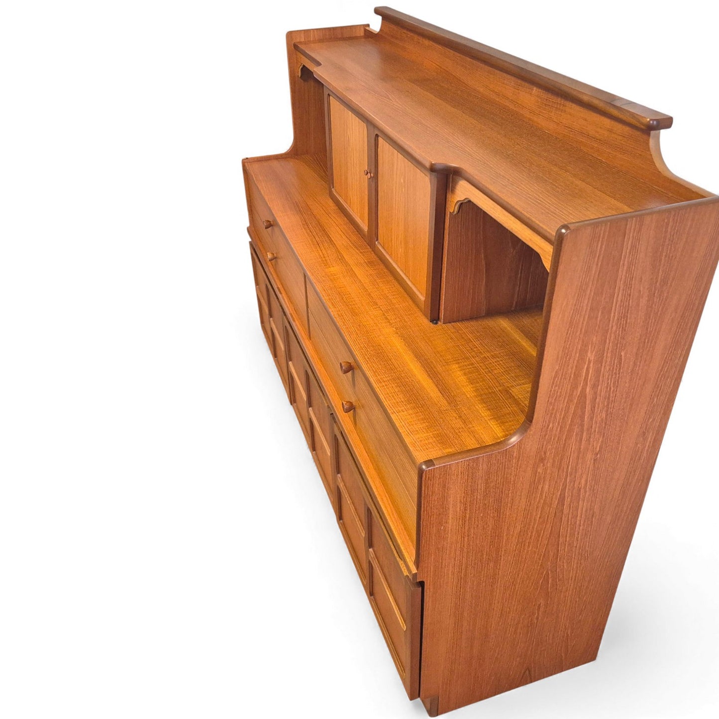Side view of mid-century teak sideboard showing two-tier design
