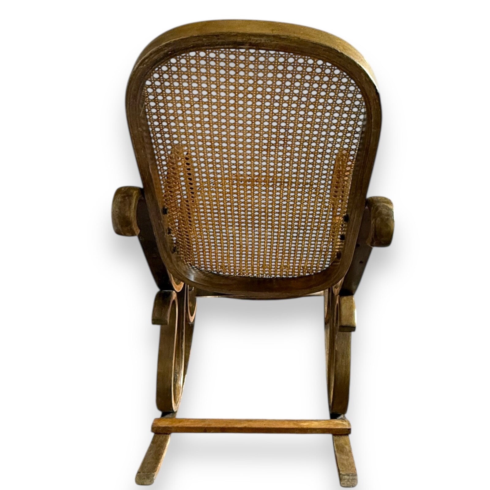 Thonet style rocking chair – back view showing woven cane backrest